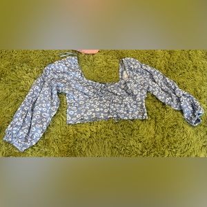 long sleeve blouse with flower designs, ties in front, puffed up sleeves